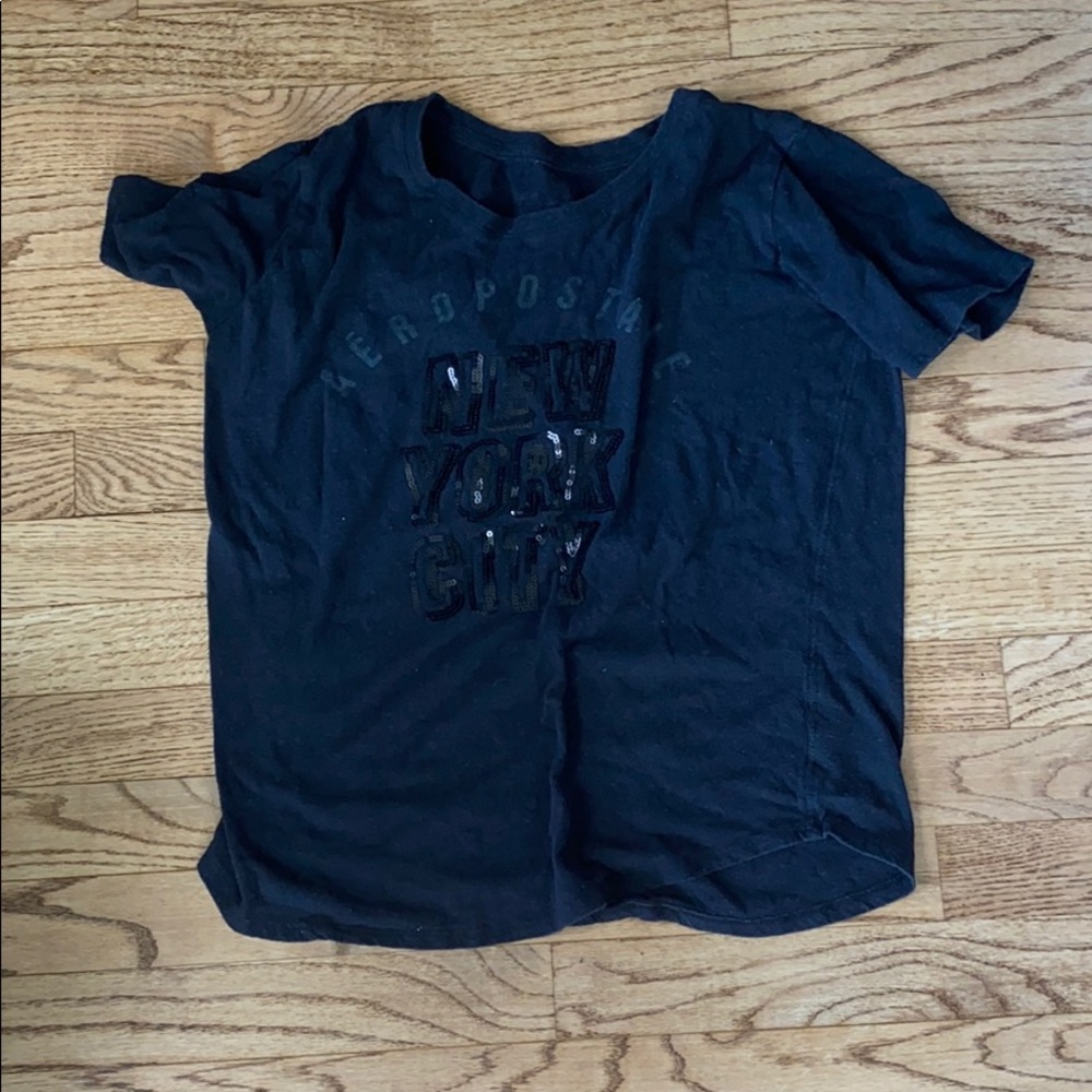 black t-shirt with writing